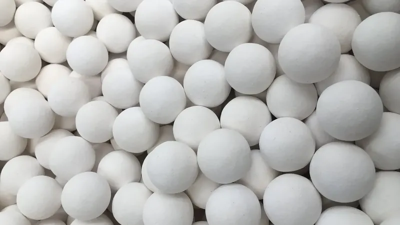 Spherical activated alumina desiccant media